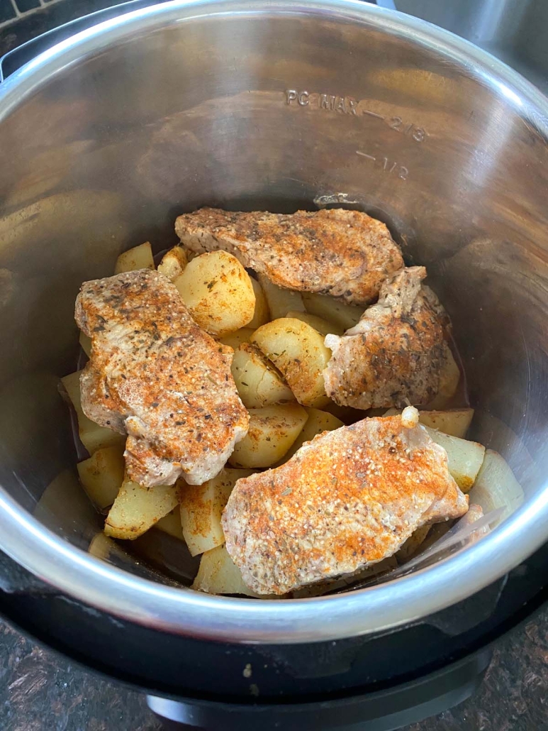 Pork Chops And Potatoes cooking in the Instant Pot