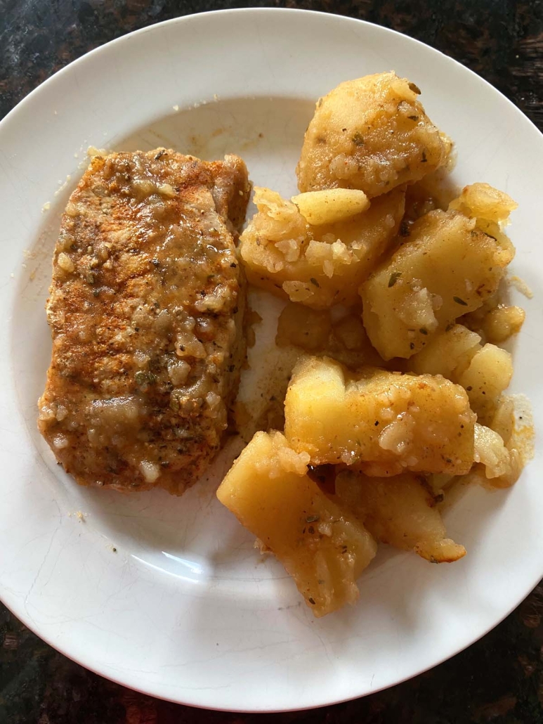 Instant Pot Pork Chops And Potatoes on a plate