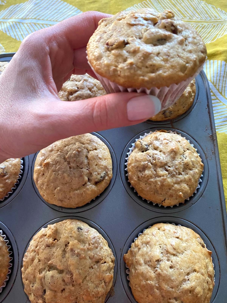 hand holding Raisin Bran Muffin