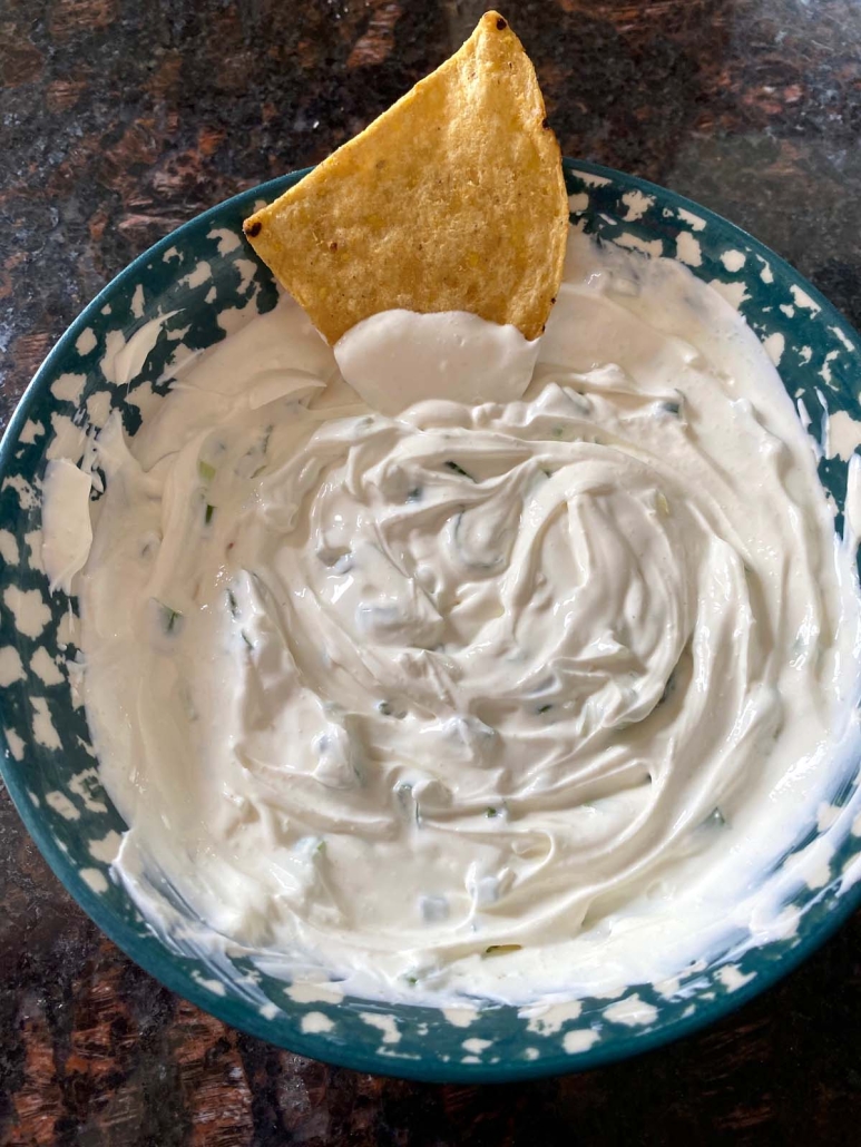 chip in creamy sour cream and onion dip