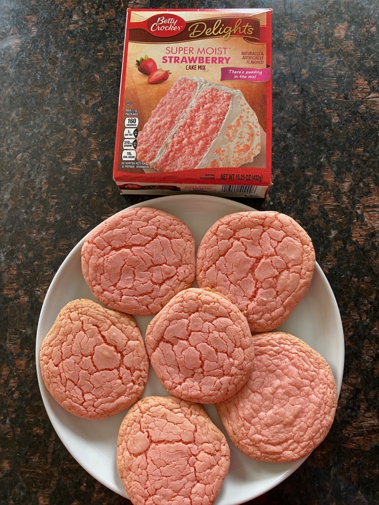 box of strawberry cake mix next to strawberry cake mix cookies