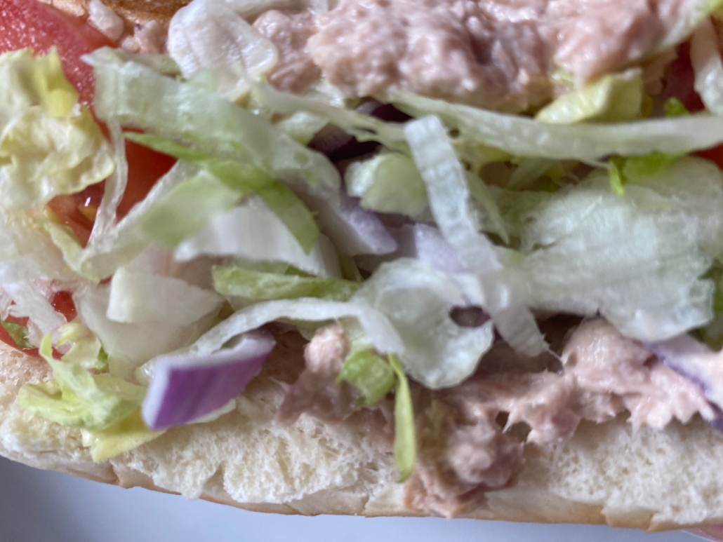 close-up of tuna salad with toppings