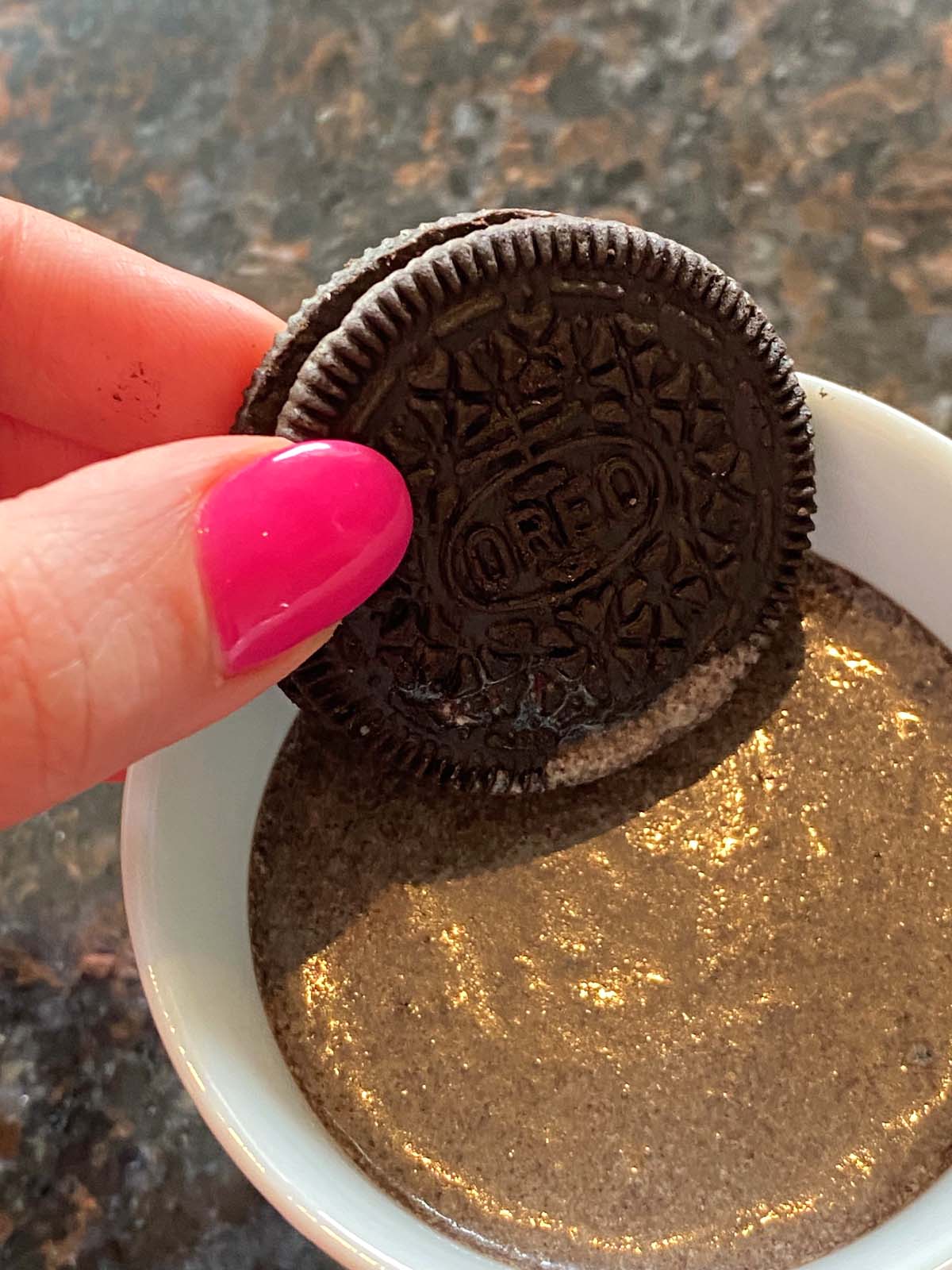 Oreo milkshake in a mug.