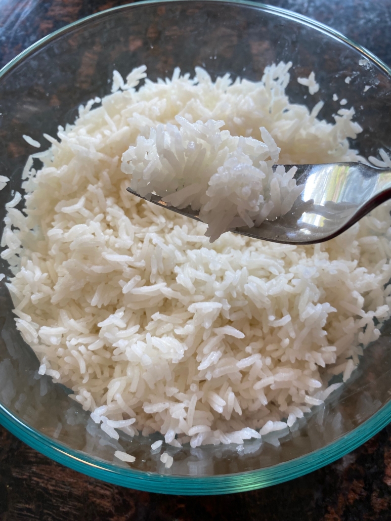 fork in easy Oven Baked Rice