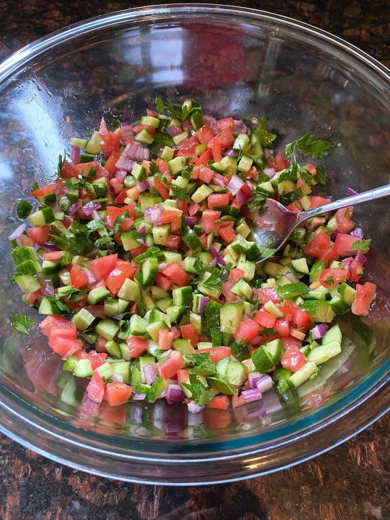 mixing up ingredients for Persian Cucumber Salad (Shirazi Salad)