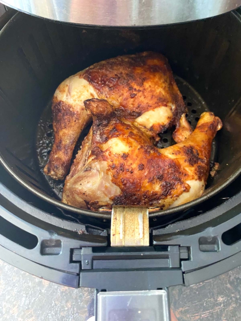 chicken leg quarters cooked inside an air fryer