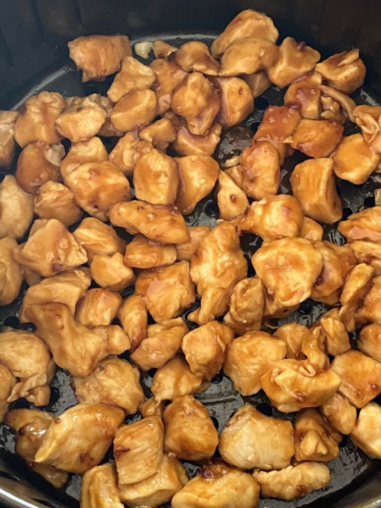close-up of Chicken Teriyaki pieces in air fryer