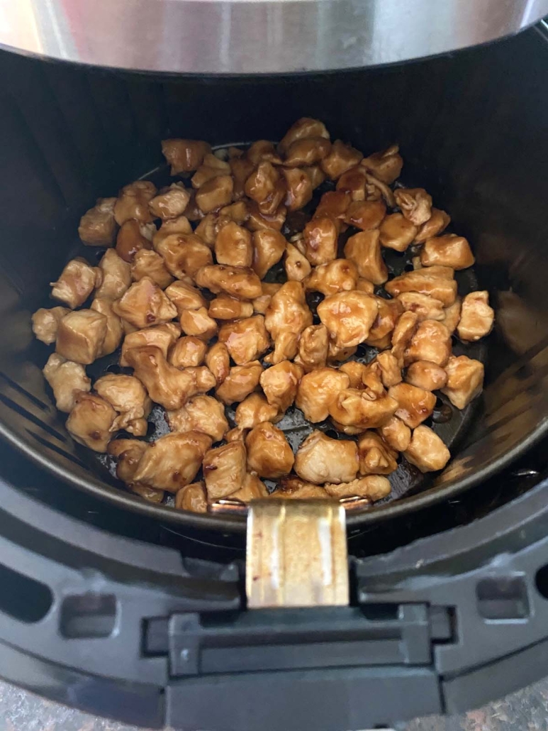air fryer opened to show Chicken Teriyaki
