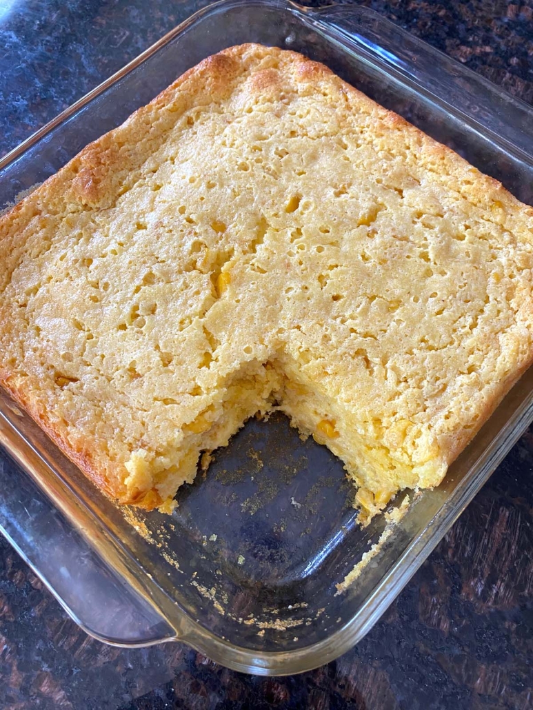 Cornbread Casserole with a piece cut out