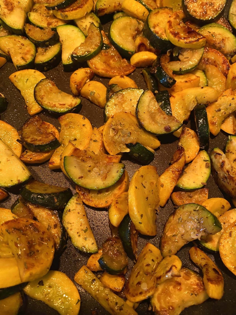 sliced zucchini and squash seasoned and cooked