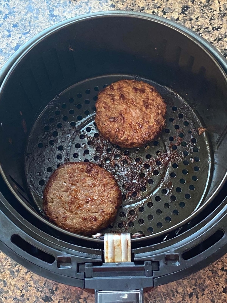 Impossible burgers cooking in air fryer