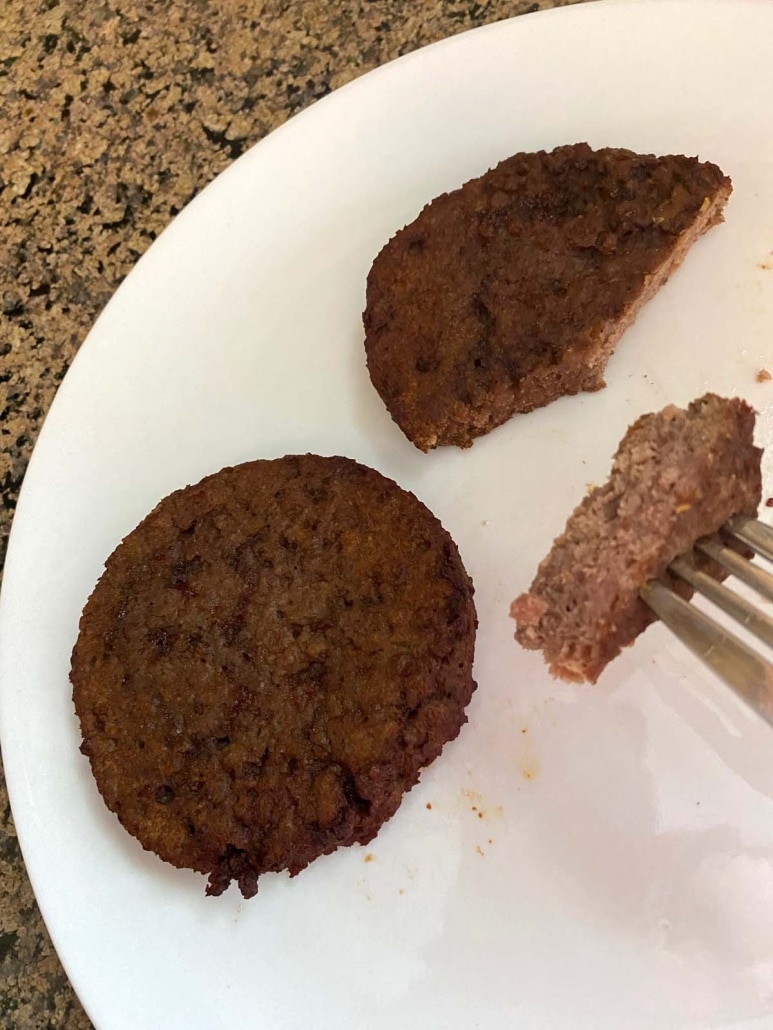 fork holding piece of Impossible burger