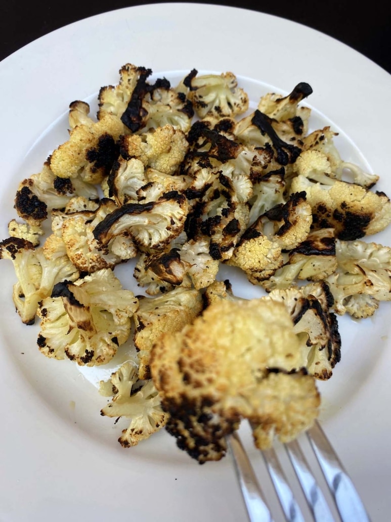 plate of seasoned, grilled cauliflower florets