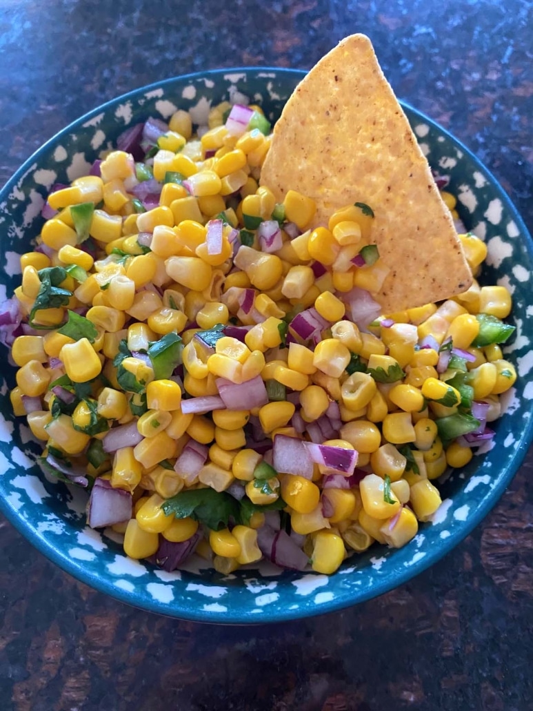 tortilla chip in Chipotle Corn Salsa Copycat 