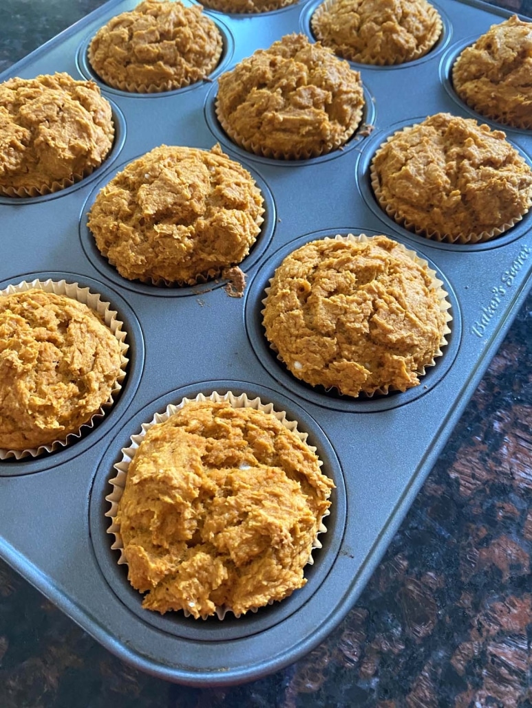 muffin tin filled with 2-Ingredient Pumpkin Muffins