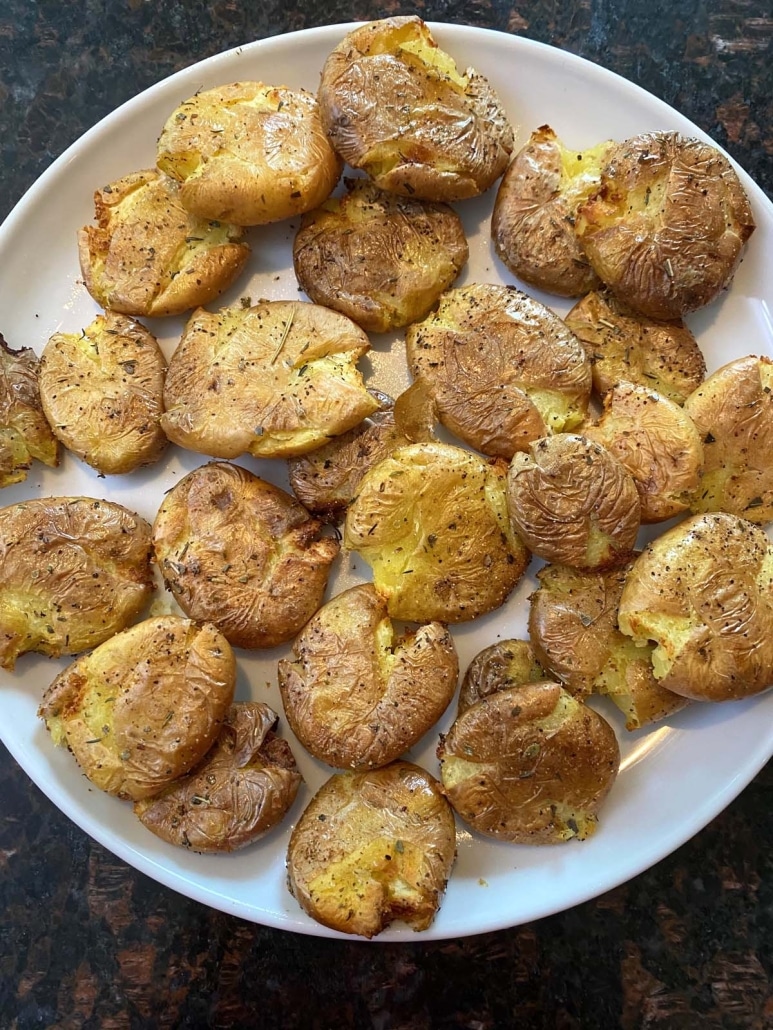 smashed potatoes on a plate