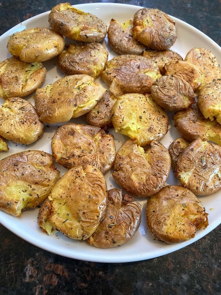 plate of air fryer smashed potatoes