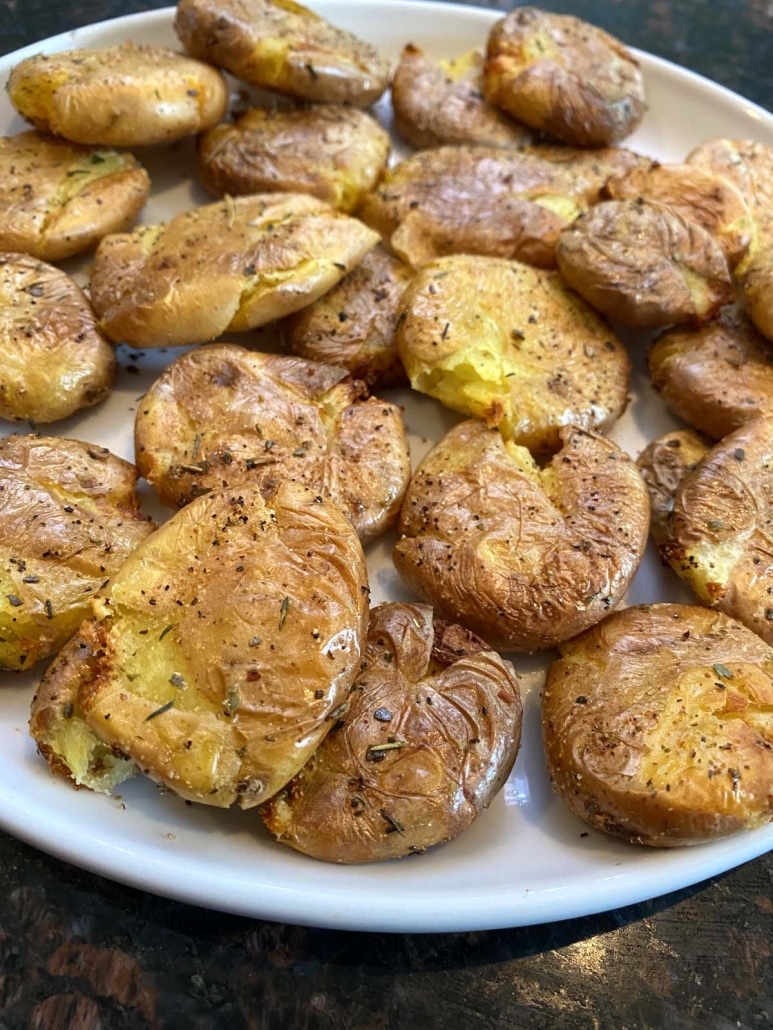 seasoned yellow small potatoes on a plate 