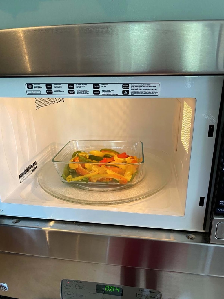 dish of sliced bell peppers in the microwave