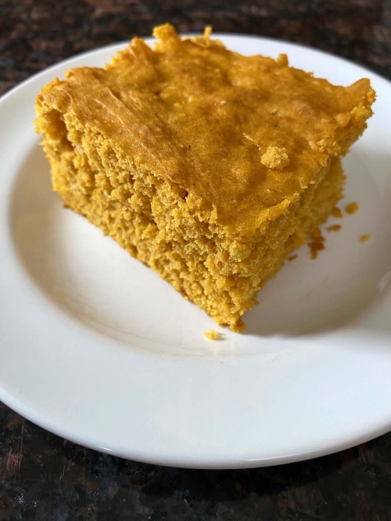 3 Ingredient Pumpkin Dump Cake slice on a plate