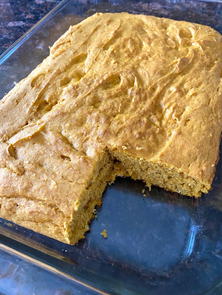 3 Ingredient Pumpkin Dump Cake With Cake Mix with a slice cut out