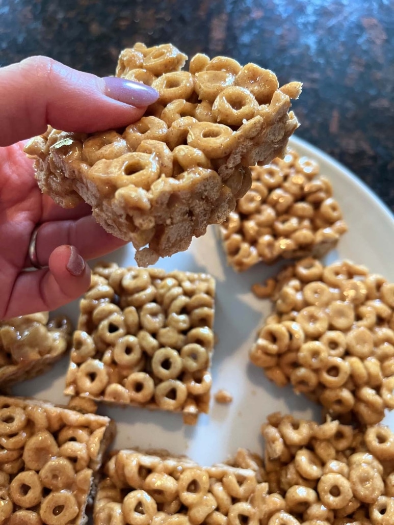 hand holding Cheerios Peanut Butter Bar