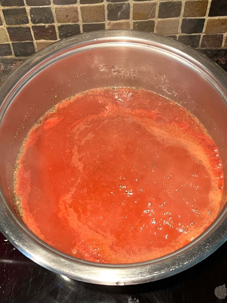 easy tomato soup bubbling to a boil