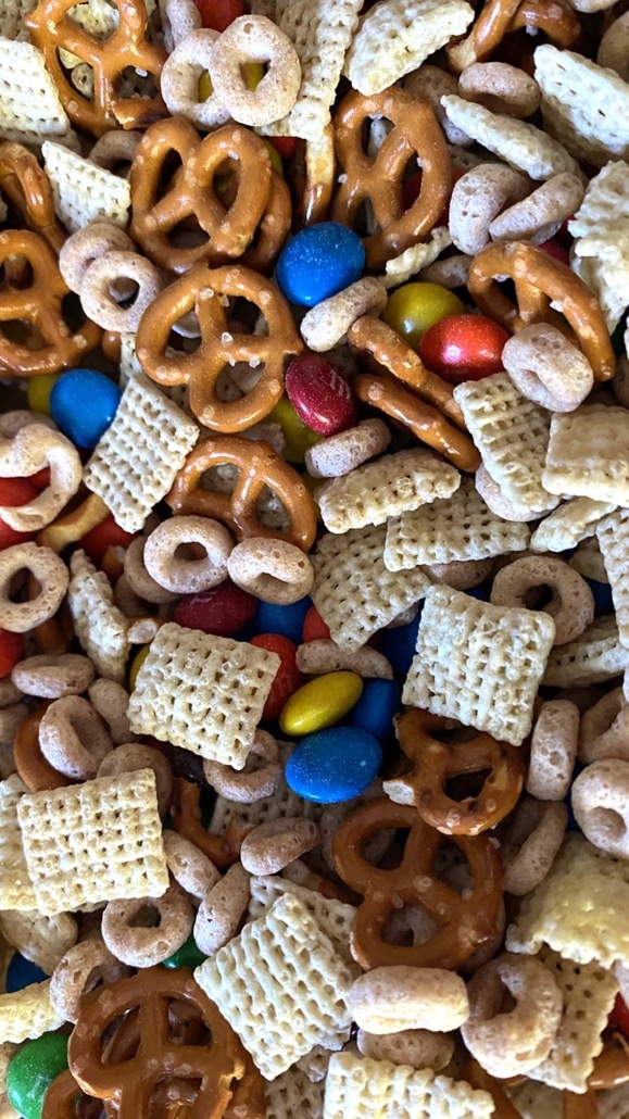 Chex cereal, Cheerios, pretzels, and M&M's mixed together