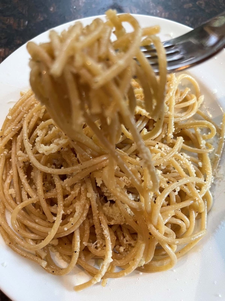 forkful of Whole Wheat Spaghetti With Garlic And Olive Oil