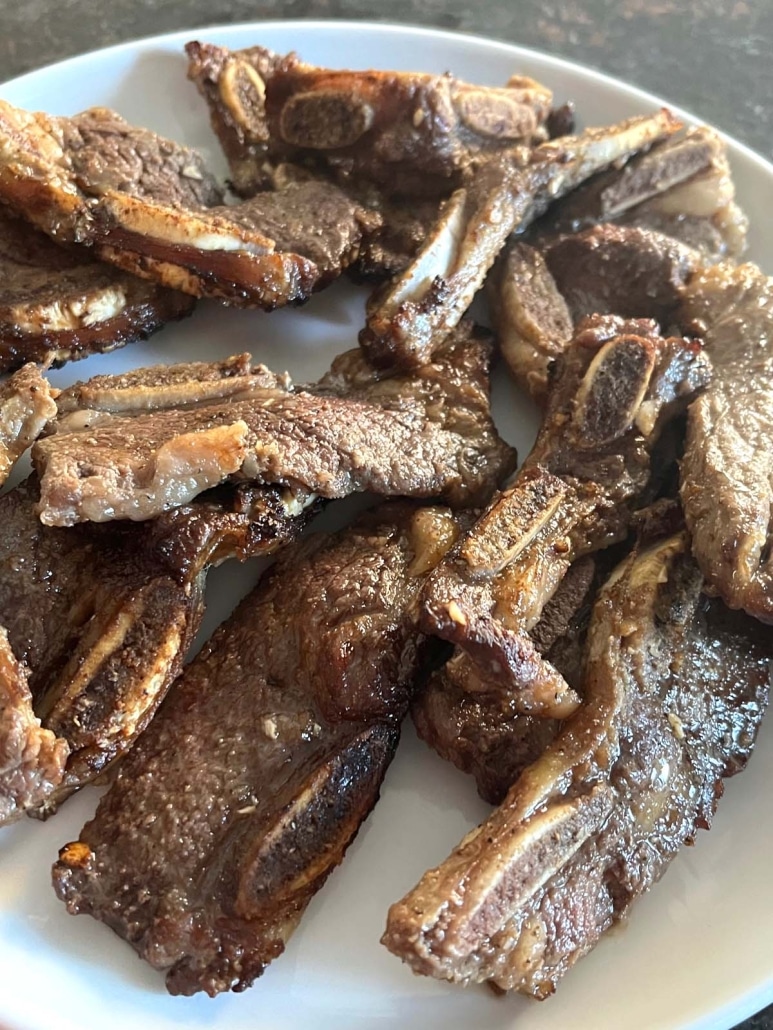 flavorful beef short ribs on a plate