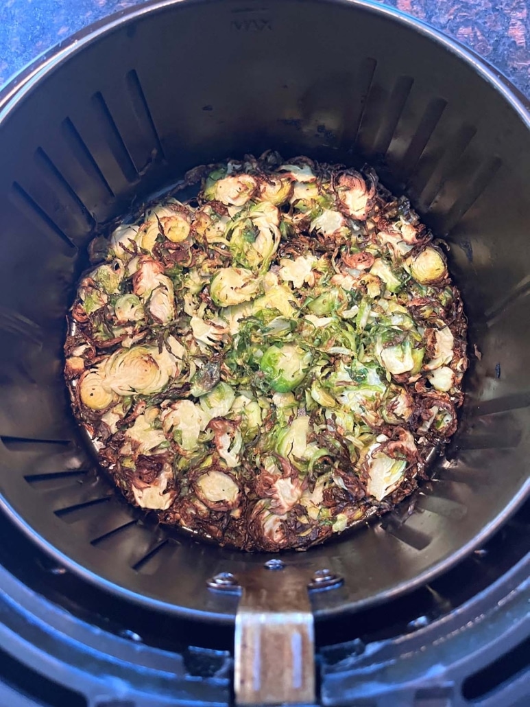 cooked brussels sprouts in air fryer basket