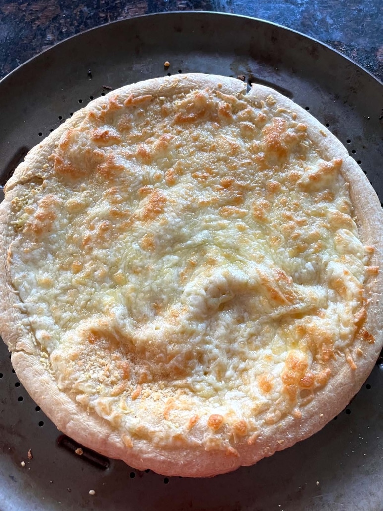 Garlic Pizza on a cooking sheet