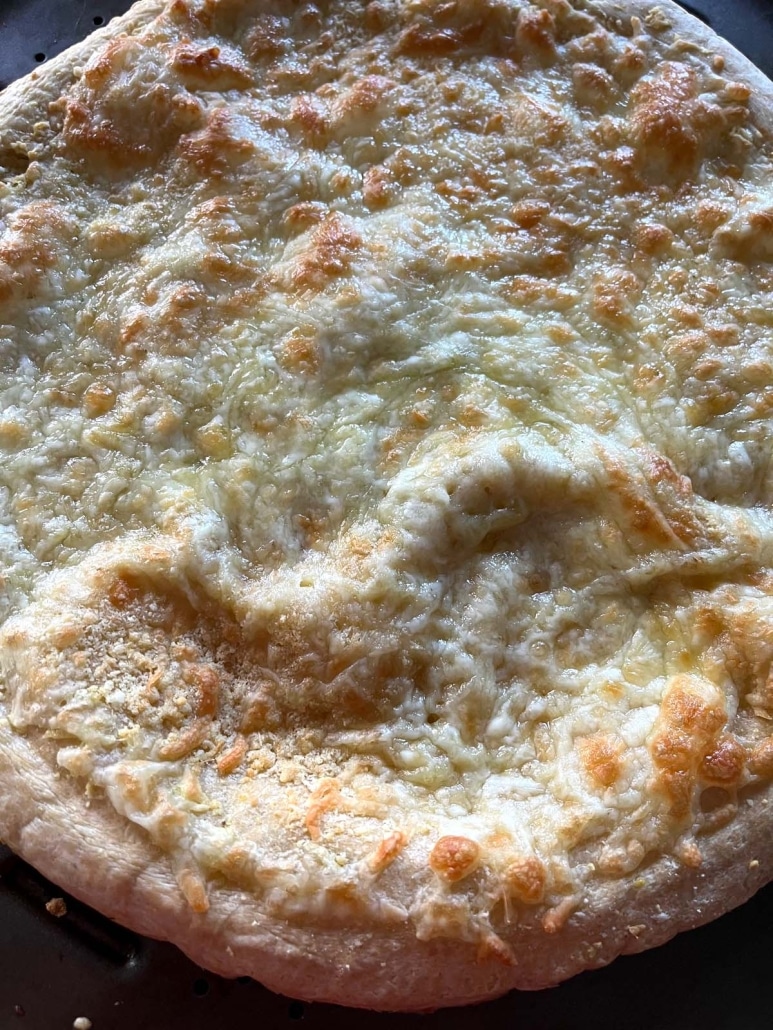 golden brown melted cheese on a Garlic Pizza