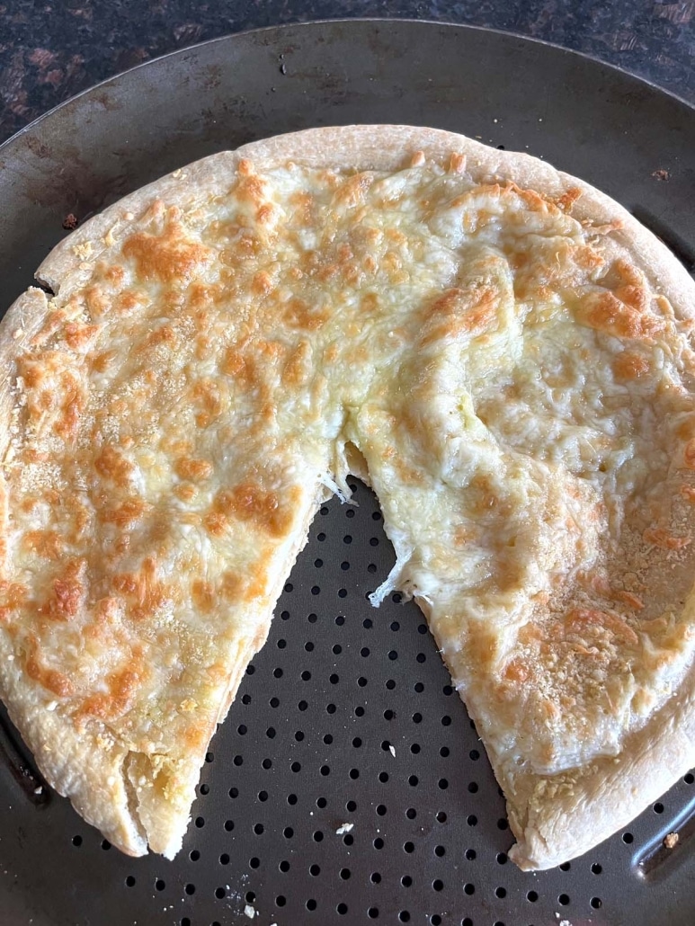 Garlic Pizza with a slice taken out