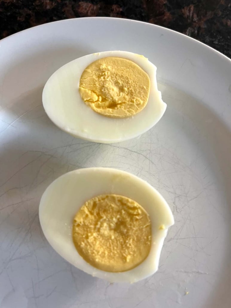 sliced hard boiled egg on a plate