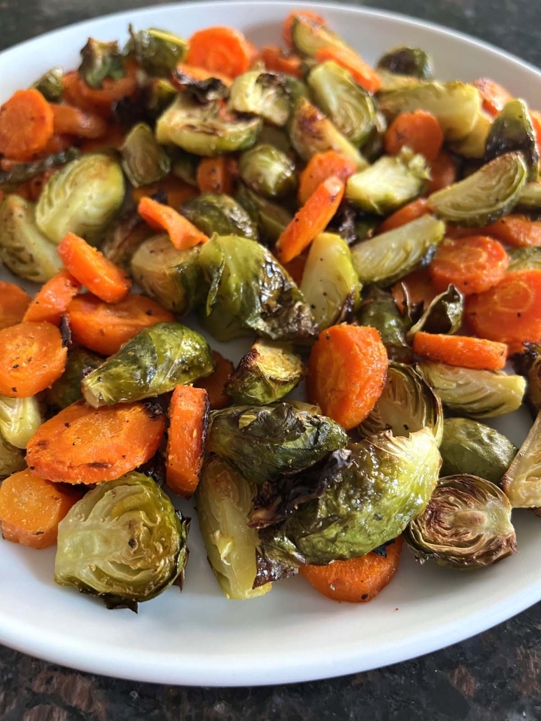 bowl of easy vegetable dish Roasted Brussels Sprouts And Carrots
