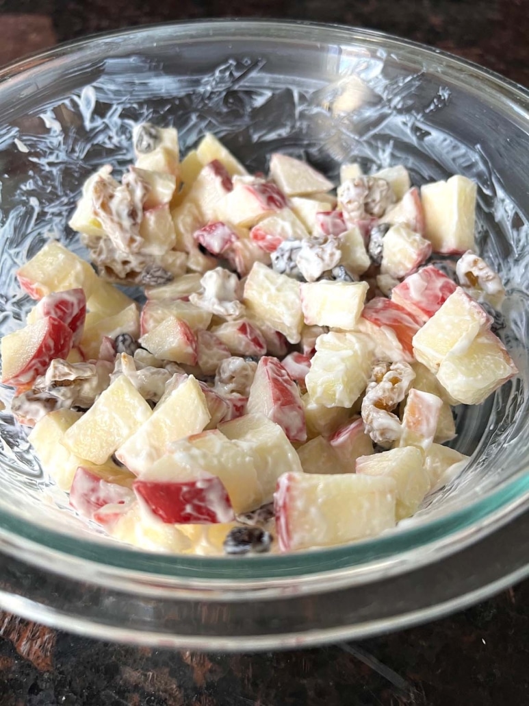 ingredients for easy Apple Raisin Salad in a bowl