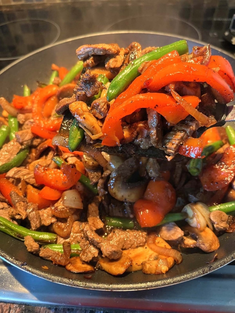 cooking up black pepper angus steak stir fry