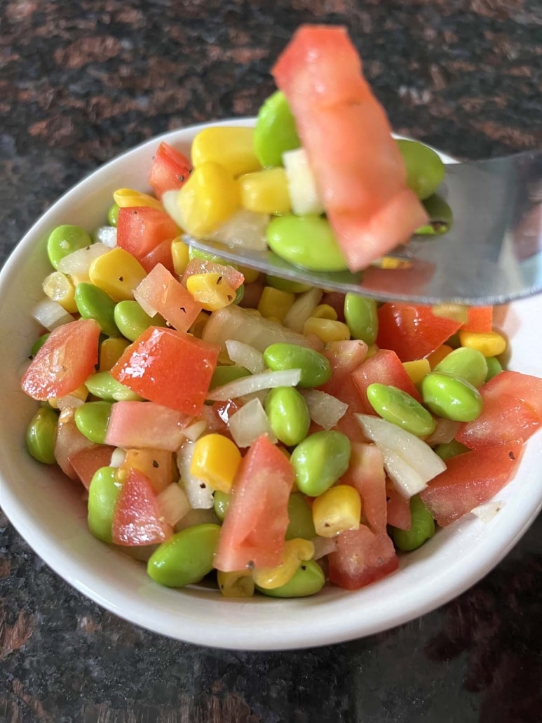 forkful of fresh ingredients in Edamame Salad