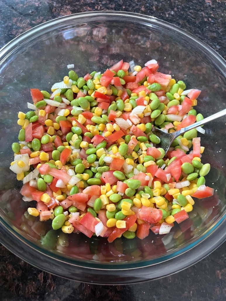 toss Edamame Salad in a simple dressing