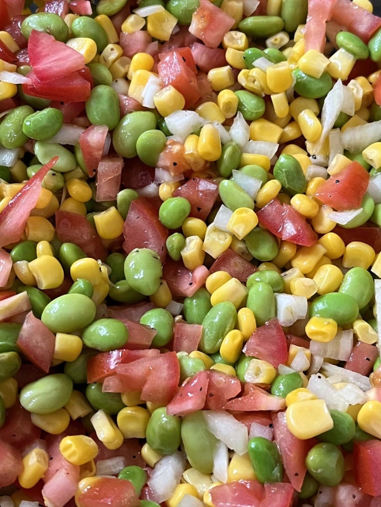 corn, tomatoes, onions, and edamame in Edamame Salad