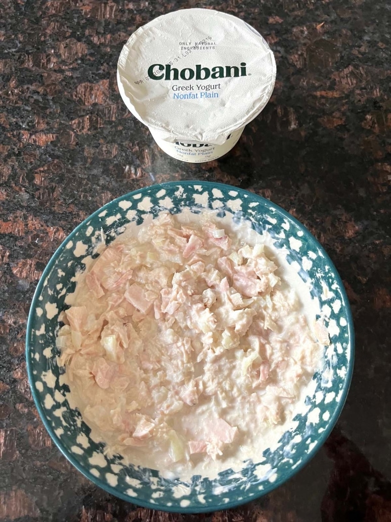 bowl of low carb tuna salad next to a container of Greek yogurt