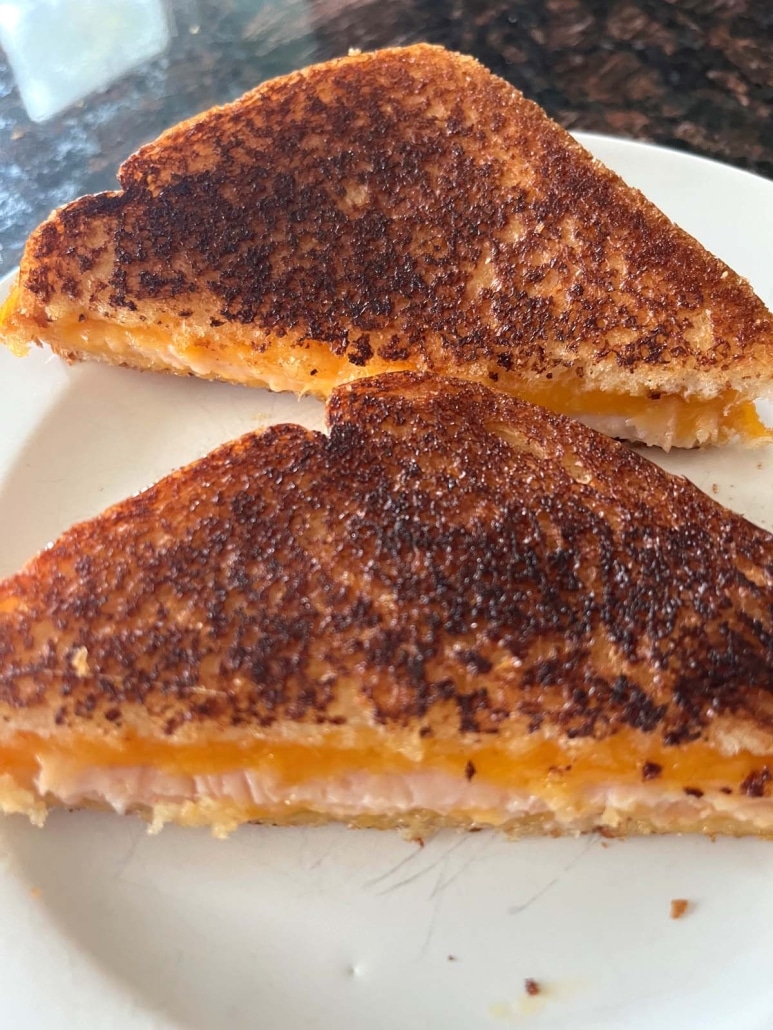 Grilled Turkey And Cheese Sandwich with warm turkey and melted cheese
