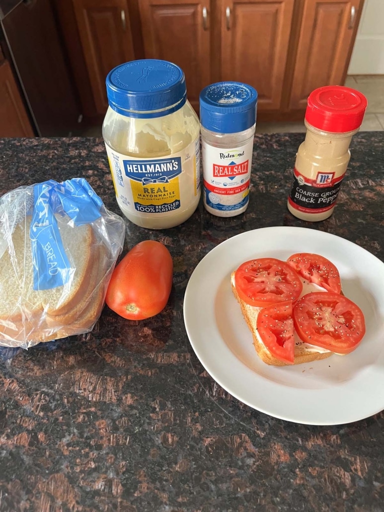 Tomato Toast next to the ingredients bread, tomato, mayo, seasonings