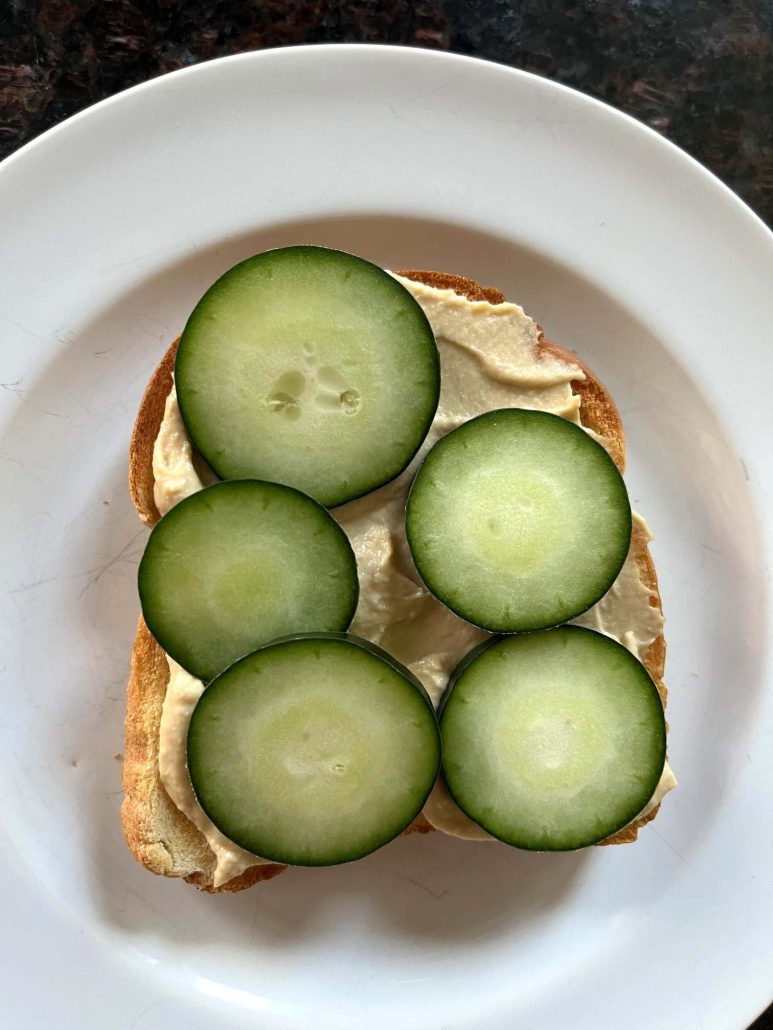 refreshing and satisfying Hummus Toast on a plate