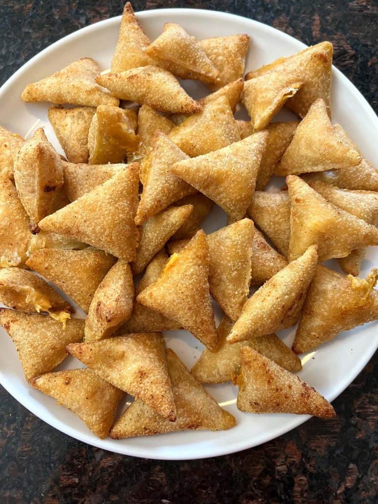 Plate of freshly air-fried Old El Paso Stuffed Nachos, golden and crispy, ready to be served as a tasty snack.