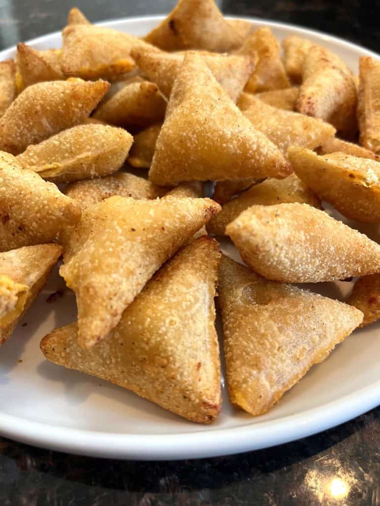 A plate filled with golden, crispy Old El Paso Stuffed Nachos.