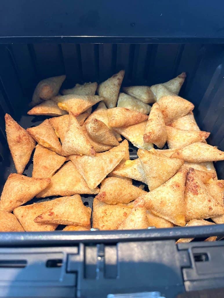 Freshly air-fried Old El Paso Stuffed Nachos in air fryer basket.