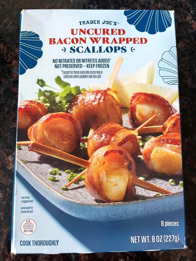 A package of uncured bacon-wrapped scallops, showing the frozen appetizer used for the air fryer recipe.