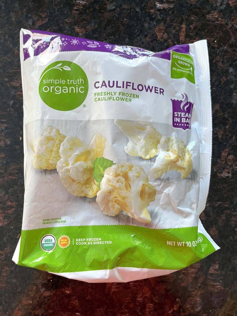 Bag of frozen cauliflower florets used for making easy air fryer cauliflower straight from frozen—no thawing needed.